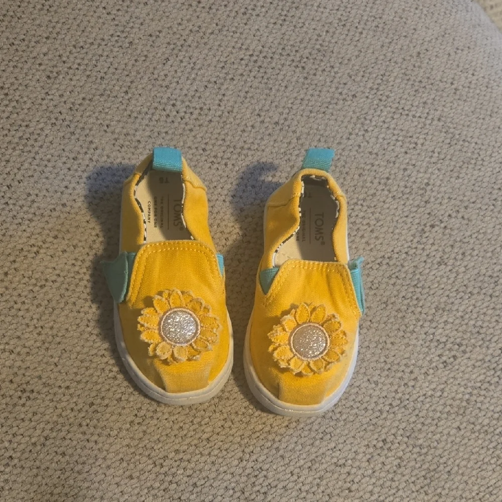TOMS Kids Yellow Slip-On Shoes with‎ Sunflower Design